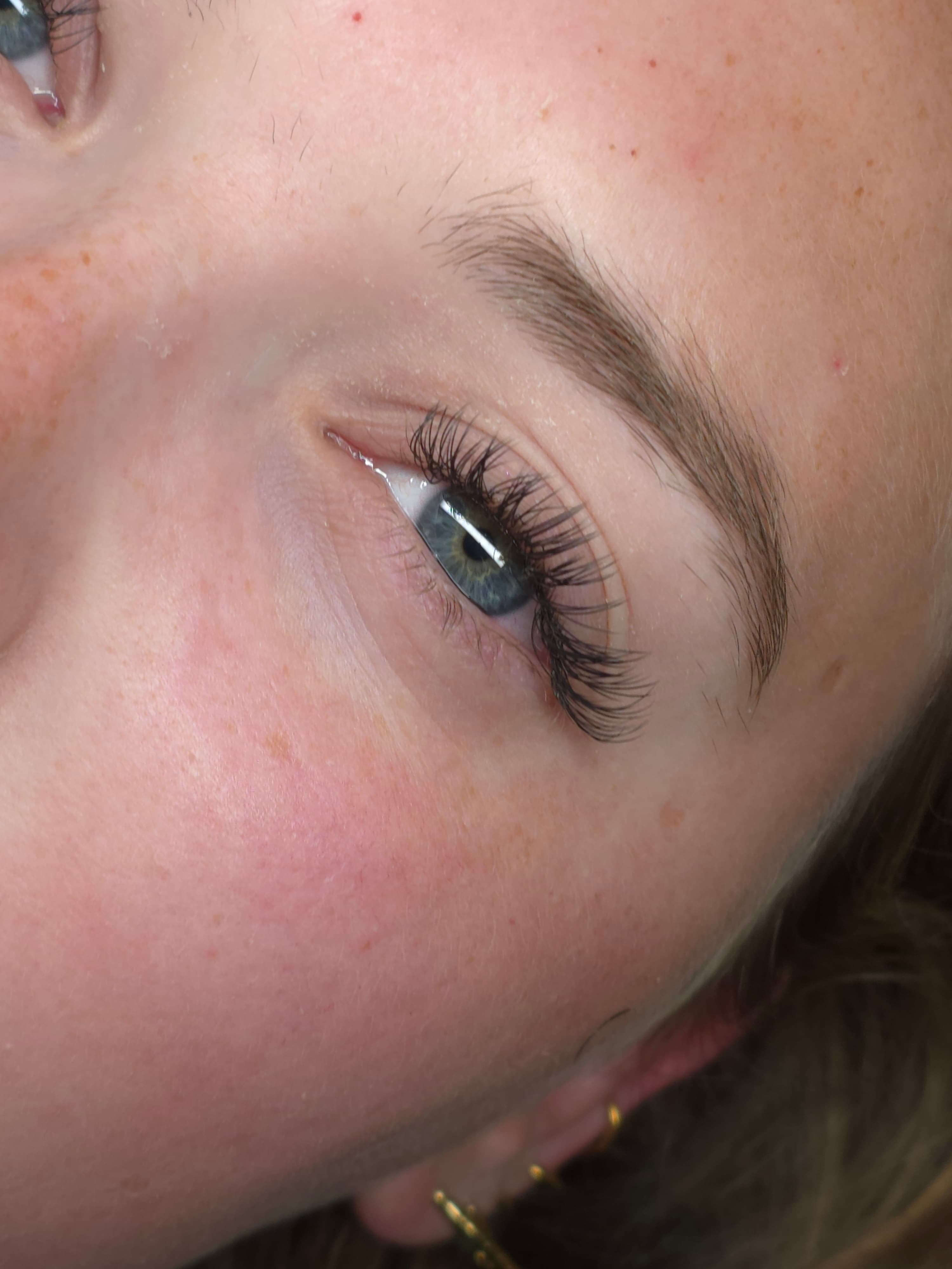Wimperextensions close-up blauw oog